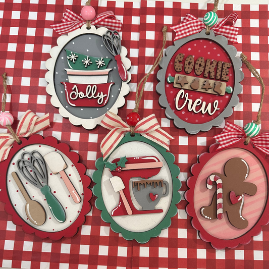 Set of Christmas-themed decorative tags on a red and white checkered background